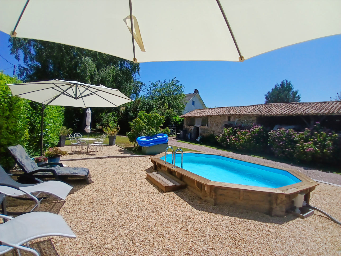 Character stone house with pool, outbuildings and  garage for sale in Dordogne village