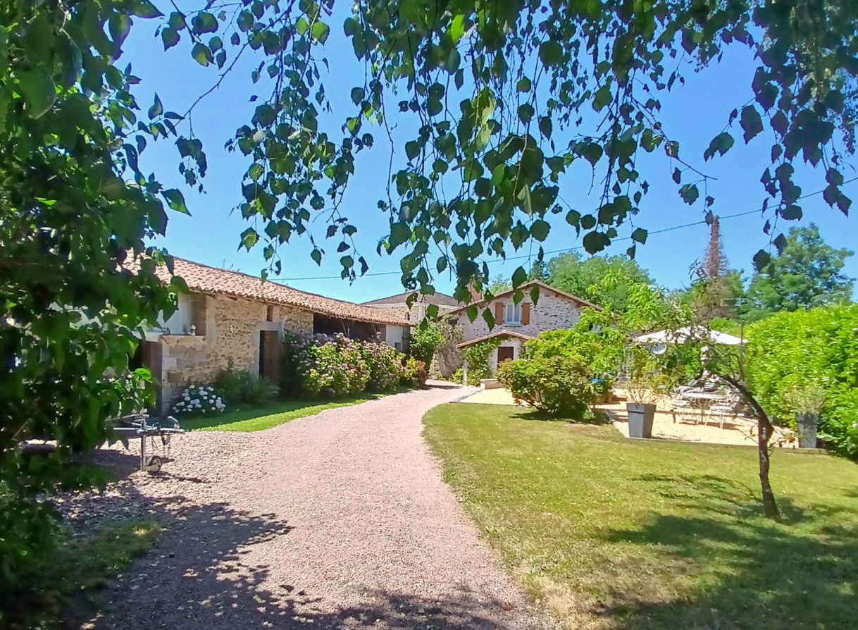 Character stone house with pool, outbuildings and  garage for sale in Dordogne village