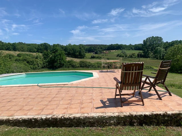 Near Aubeterre, country house with 2 guest houses, over a hectare of grounds. Beautiful views.