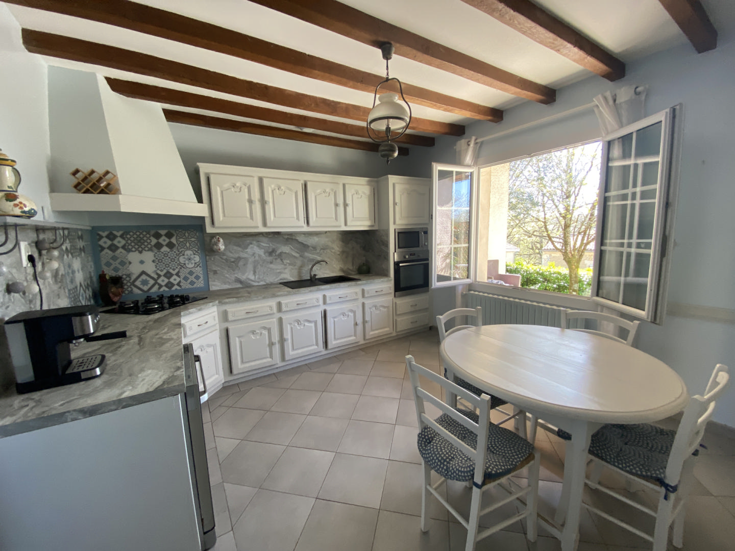 Property with Extensive Grounds. Shops and railway station within walking distance.
