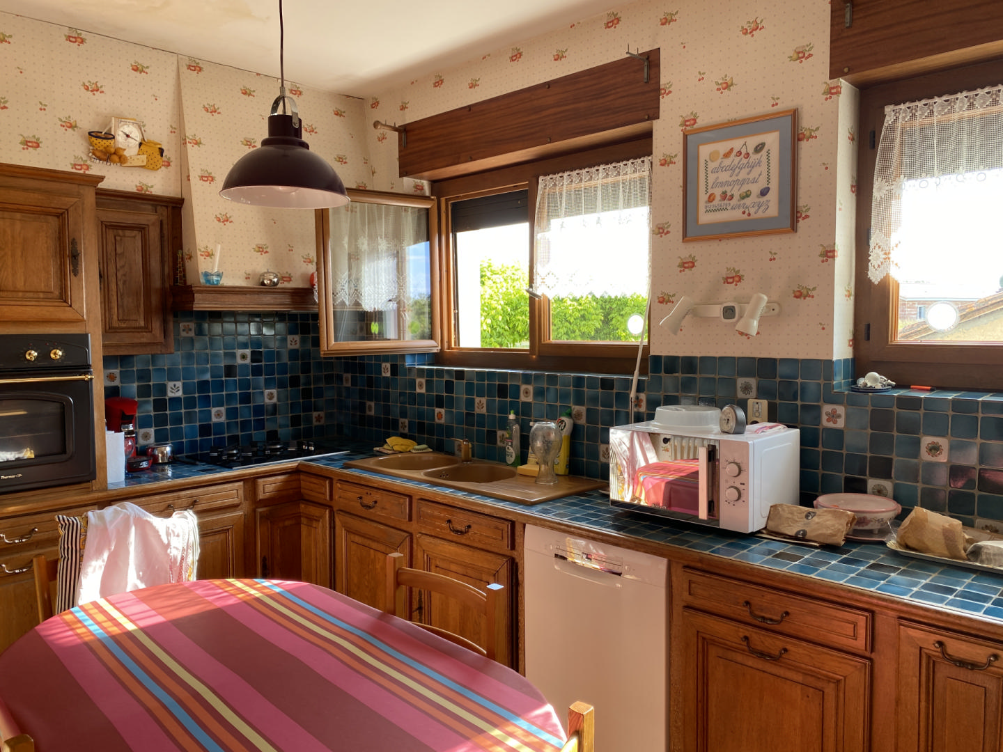 Spacious house with huge outbuildings and enclosed grounds. Bedroom on the ground floor. Shops on foot.