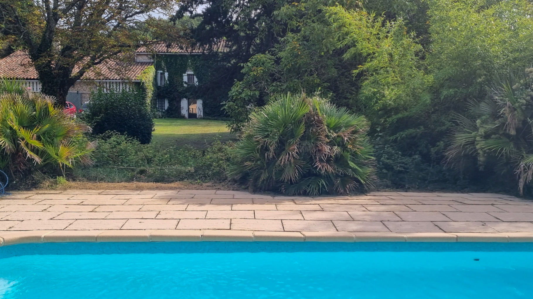 Charming 7-Bedroom Stone Country Estate with Income Potential