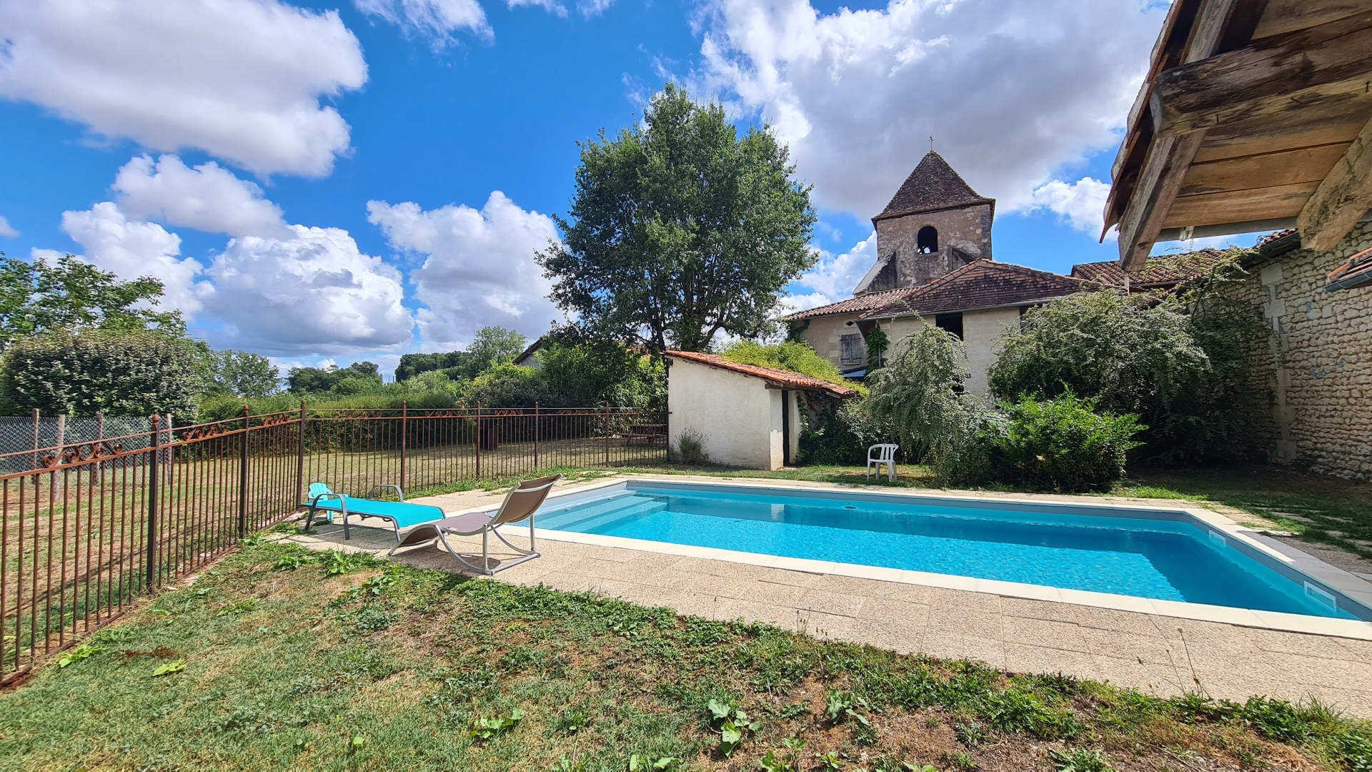 Pretty 4 bedroom village house with enclosed garden and swimming pool. Near Aubeterre.