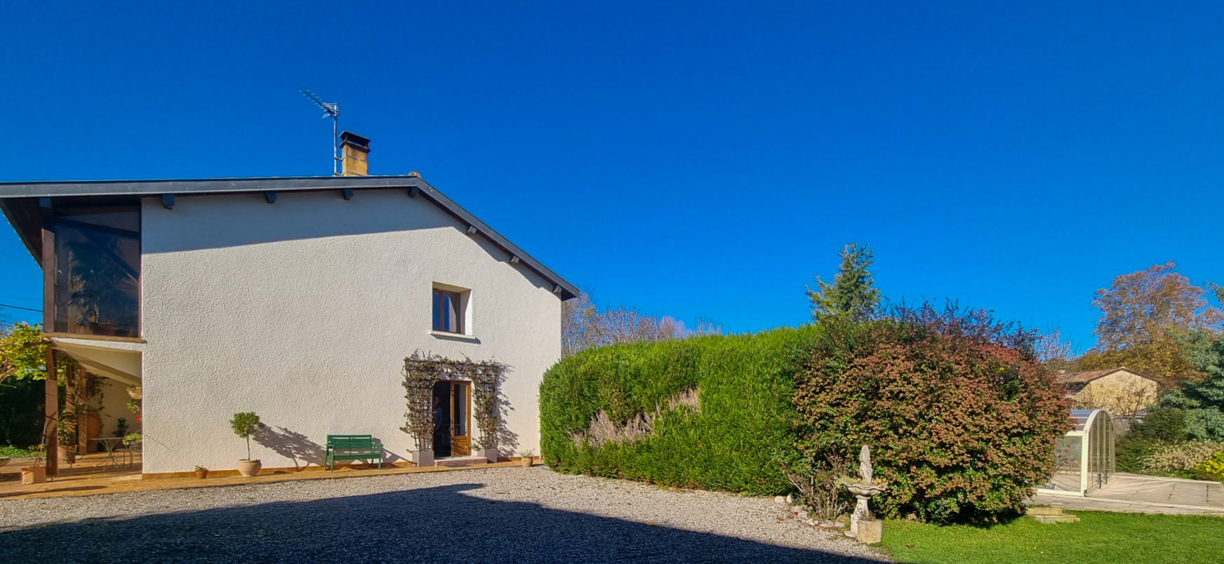 Charming Village Home with Large Gardens, Covered Pool, and Outbuildings