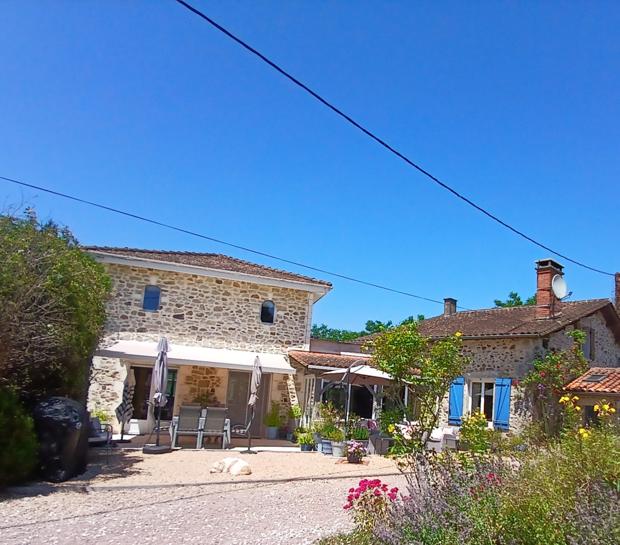 Character stone house with pool, outbuildings and  garage for sale in Dordogne village