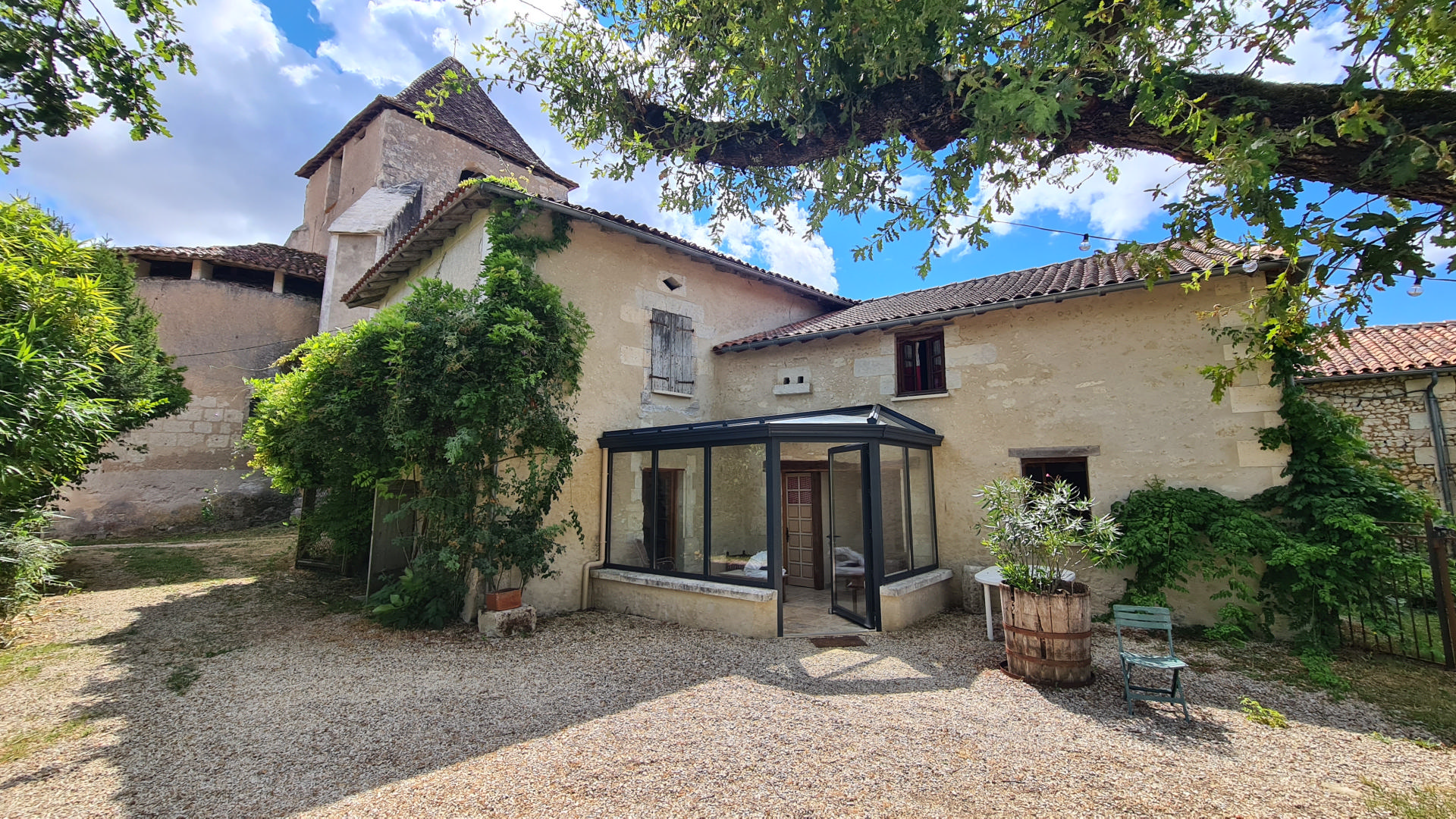 Pretty 4 bedroom village house with enclosed garden and swimming pool. Near Aubeterre.